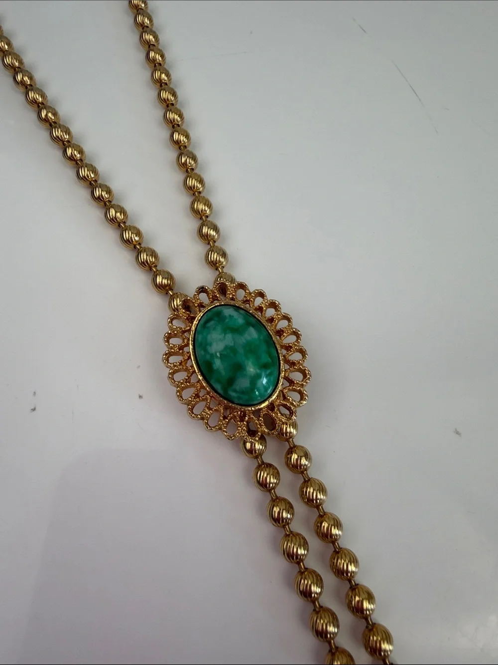 Gold Bead Lariat Necklace with Green Stone Accent